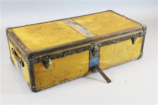 A 1920s Louis Vuitton travelling trunk, width 44in. depth 22in. height 14in.